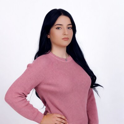 Woman in pink sweater