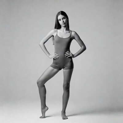 Young woman posing in bodysuit