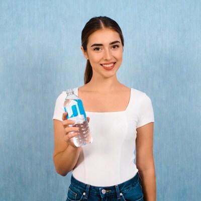 Young woman holding water bottle