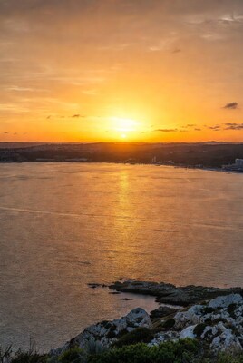 Sunset over coastal bay