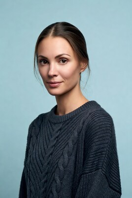 Woman in dark sweater