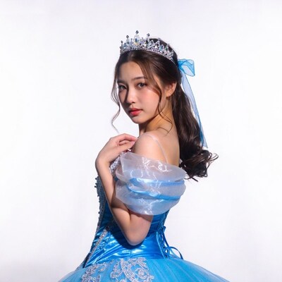 Asian woman in blue princess dress