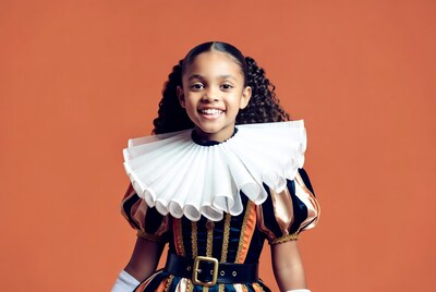 Young girl in ruffled collar costume