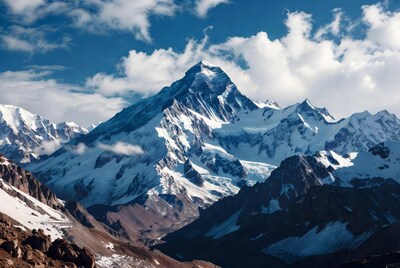 Snowy mountain peak under blue sky