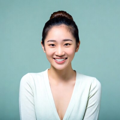 Asian woman smiling in studio
