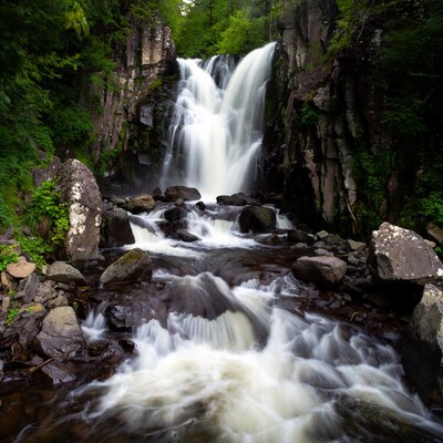 Waterfall in Rocky Forest
