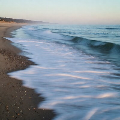 Ocean waves on sandy beach