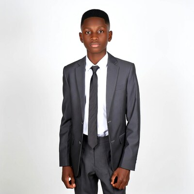 Young boy in gray suit