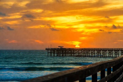 Sunset over ocean pier