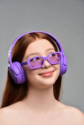 Young woman wearing purple headphones