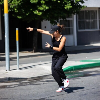Woman dancing on street