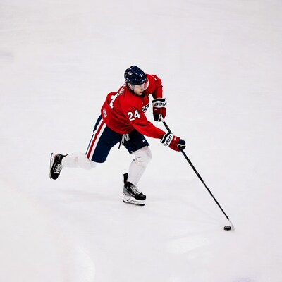 Hockey player skating on ice
