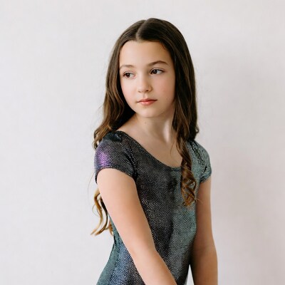 Young girl in sparkly dress