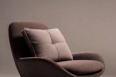 Brown armchair with pillow