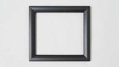 Black picture frame on white wall