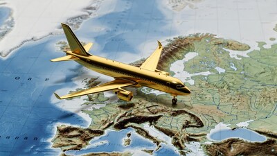 Golden airplane on world map