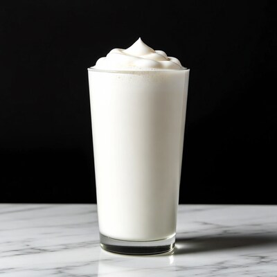 Glass of milk with whipped cream