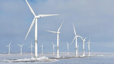 Wind turbines in snowy landscape