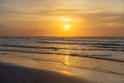 Sunset over ocean beach