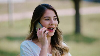 Young woman talking on phone