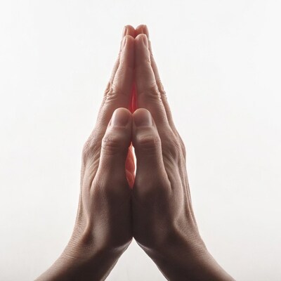Hands in prayer position