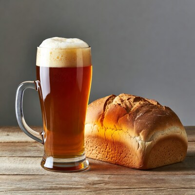 Glass of beer with bread loaf