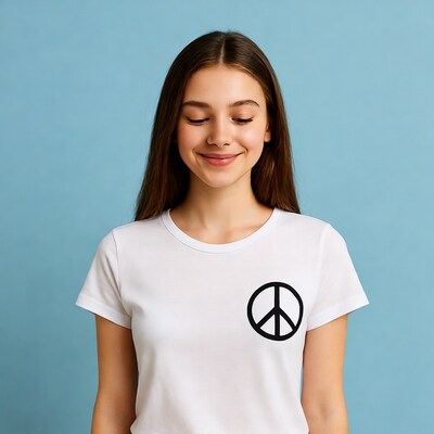 Young woman wearing peace sign shirt