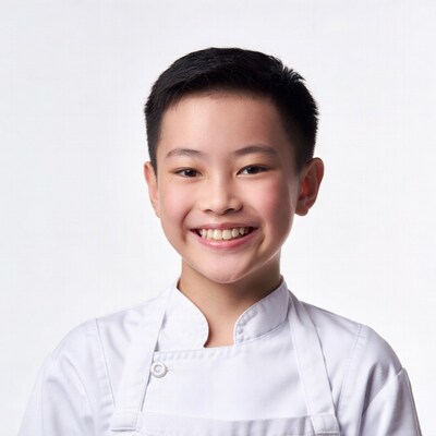 Asian boy in chef uniform