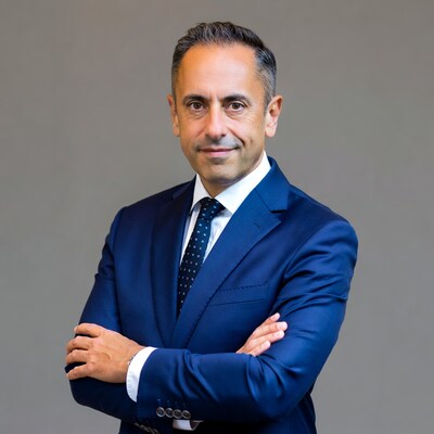 Middle Eastern man in blue suit