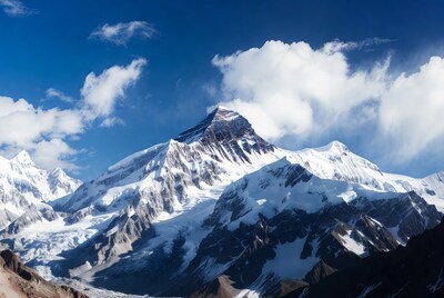 Snowy mountain peak under blue sky