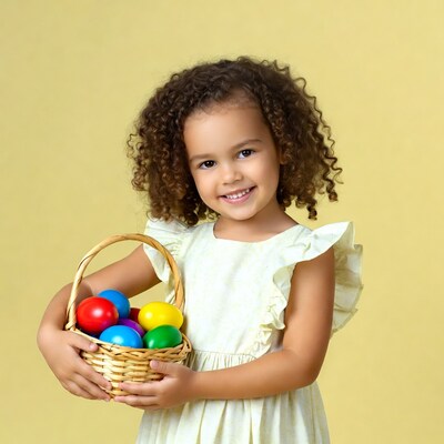 Young girl holding basket of eggs
