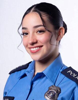 Young woman in police uniform