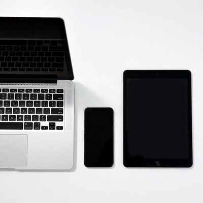 Laptop smartphone and tablet on white