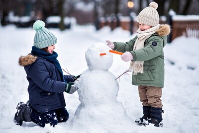 Kids building a snowman