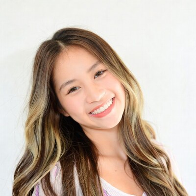 Smiling Asian woman with long hair