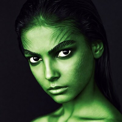 Green skinned woman close up portrait