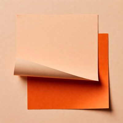 Peach paper over orange paper