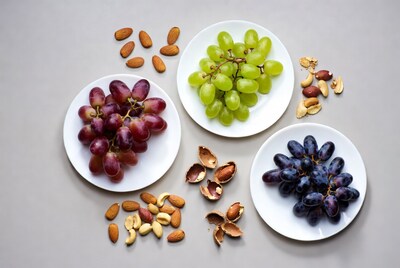 Plates of grapes and mixed nuts