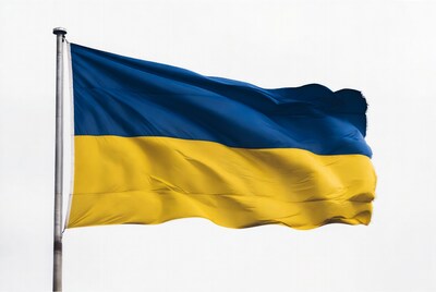 Ukrainian flag waving on pole