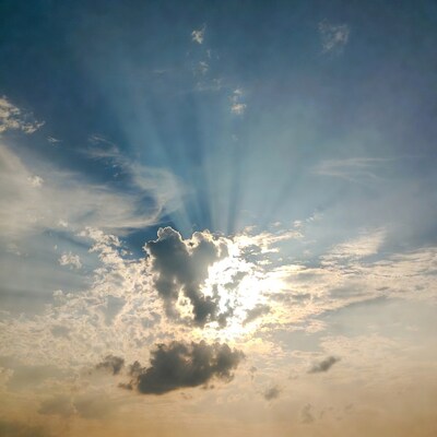 Sun rays through clouds