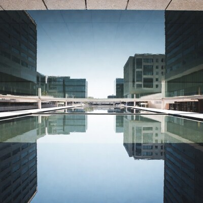 Modern buildings reflected in water