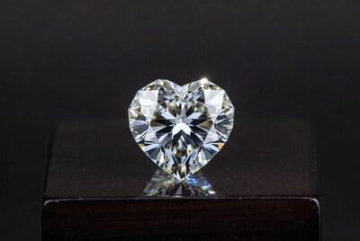Heart shaped diamond on dark background