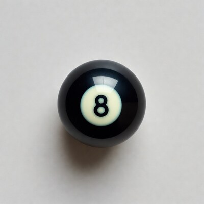 Black eight ball on white background