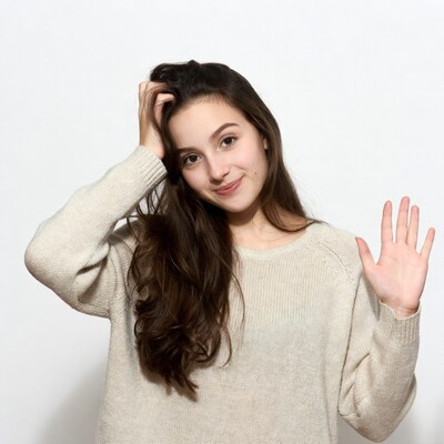 Young woman waving hand