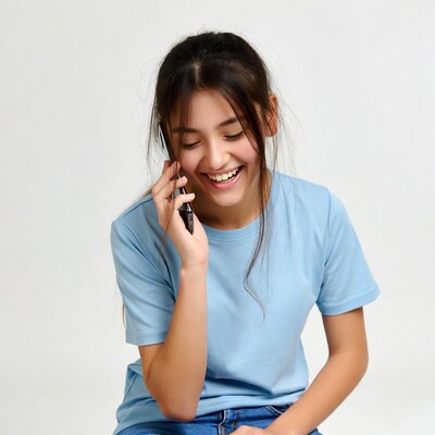 Young woman smiling on phone call