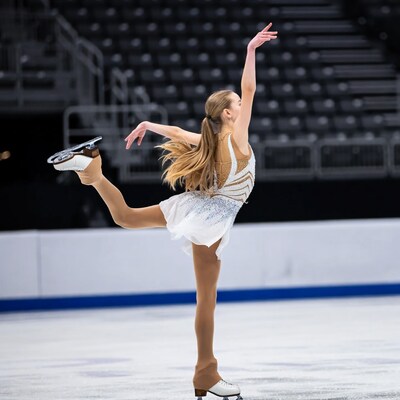 Female Figure Skater Performing Spin