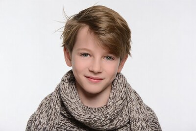 Smiling boy with scarf