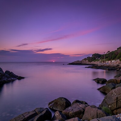 Purple Sunset Rocky Coastline