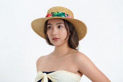 Asian woman in straw sun hat