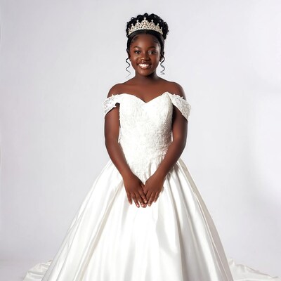 Young Black Girl in White Quinceanera Dress